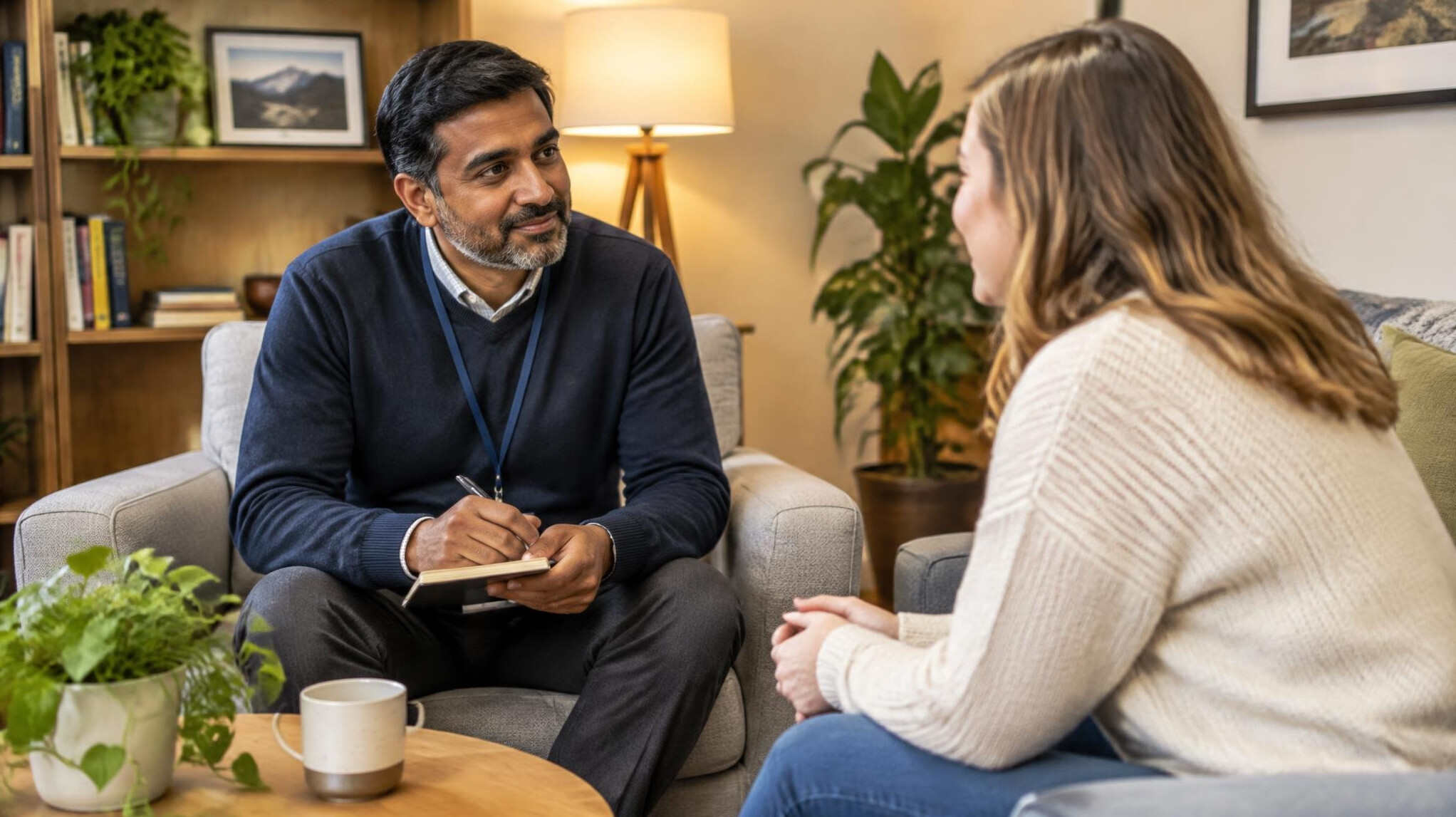 Counselor having a supportive one-on-one conversation with an employee